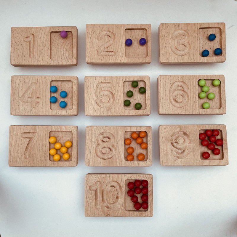 Domino number tiles with a compartment