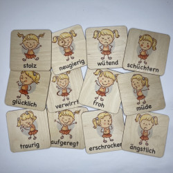 Montessori emotional cards girl
 language-german Emotion-happy